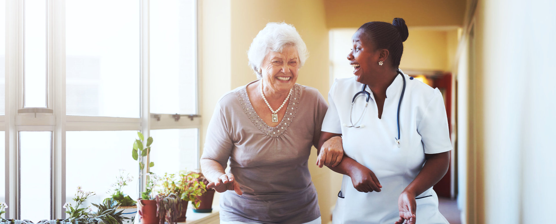 caregiver laughing with the patient